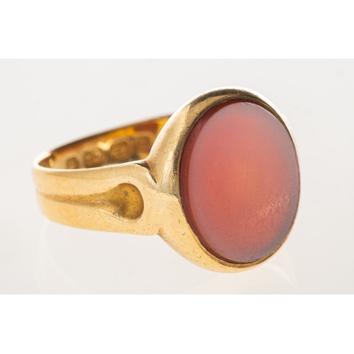 948 - A Victorian 18ct gold signet ring, set with an oval plaque of carnelian with an overlay of white sto... 