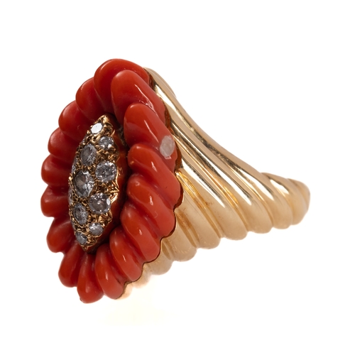 1117 - A 1970's 18ct gold coral and diamond cocktail ring, of navette form and set to the centre with brill... 