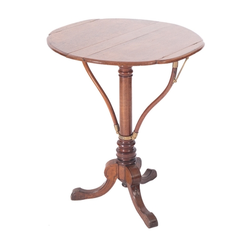 1004 - Swann & Millicon - An unusual Victorian mahogany and brass metamorphic music stand, the circular top... 