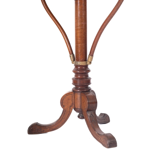 1004 - Swann & Millicon - An unusual Victorian mahogany and brass metamorphic music stand, the circular top... 