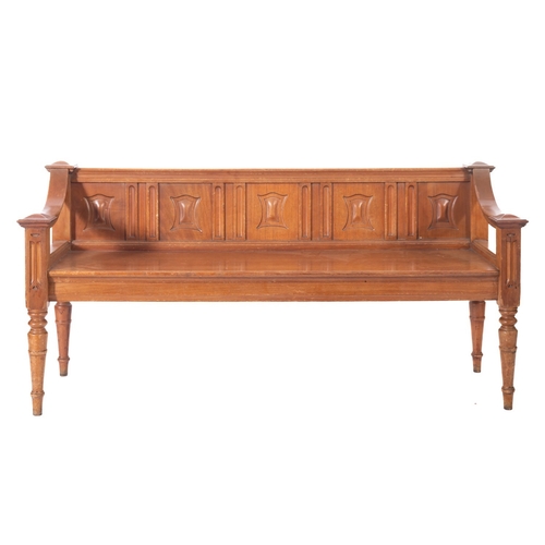 1016 - A Victorian walnut hall bench seat, the low back with moulded top rail and five panels with blank sh... 