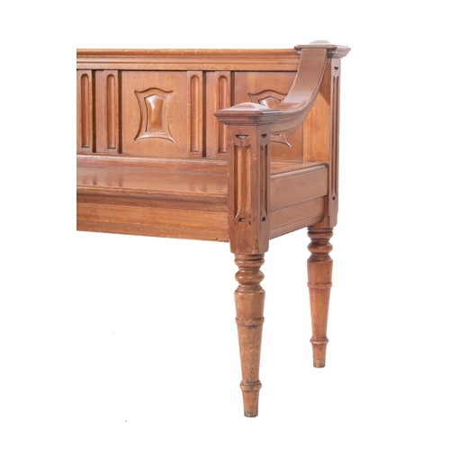 1016 - A Victorian walnut hall bench seat, the low back with moulded top rail and five panels with blank sh... 