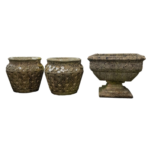 1174 - A pair of stone composition garden urns, almost certainly Cotswold Studios Ltd., 20th century; the s... 