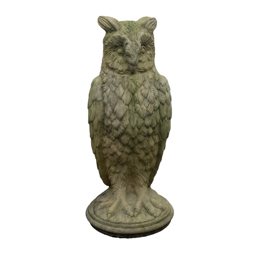 1178 - A stone composition garden model of an owl, probably cast by Haddonstone, modern; portrayed as stand... 