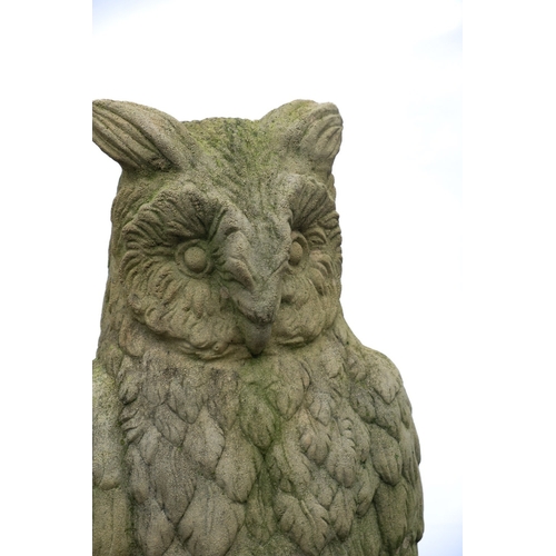 1178 - A stone composition garden model of an owl, probably cast by Haddonstone, modern; portrayed as stand... 