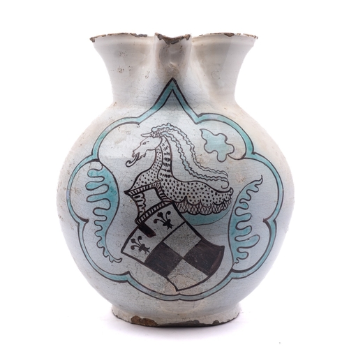 118 - A massive Umbrian maiolica armorial jug, probably Orvieto, of globular form with pinched spout, pain... 