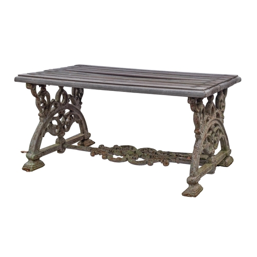 1187 - A cast iron and wood slatted garden or conservatory table, in Aesthetic taste, circa 1900 and later ... 