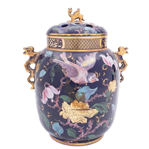 136 - An early 19th century Ironstone pot-pourri vase and cover, probably Mason's with dragon handles, ena... 