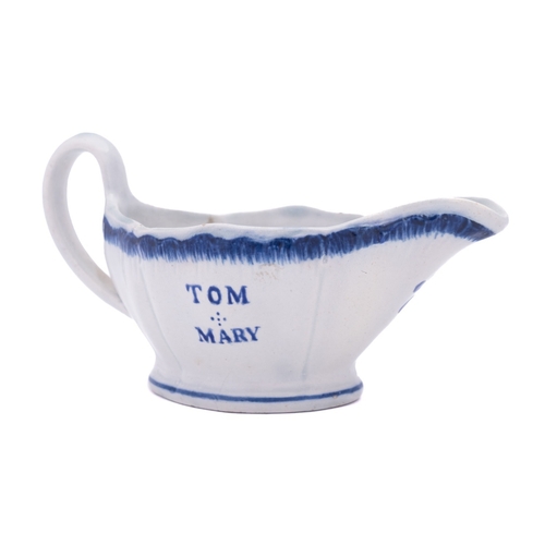 139 - A documentary pearlware sauce boat, painted in blue with H and TM over 1773 and Tom & Mary verso, be... 