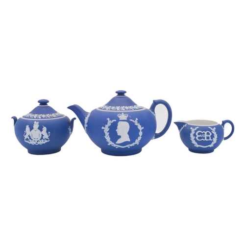 140 - A Wedgwood Edward VIII blue jasper ware commemorative tea set, comprising a teapot and cover, sucrie... 