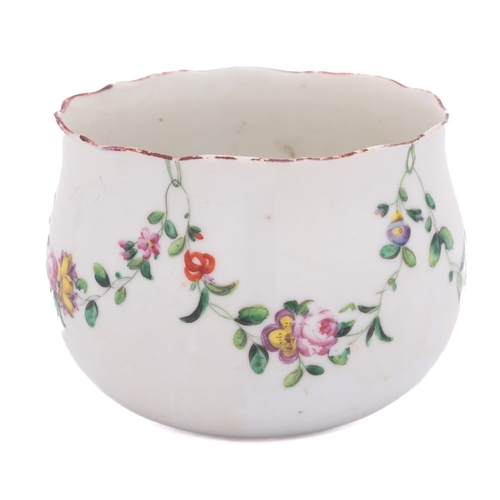 169 - A Champion's Bristol finger bowl painted with a garland of flowers and foliage suspended from green ... 