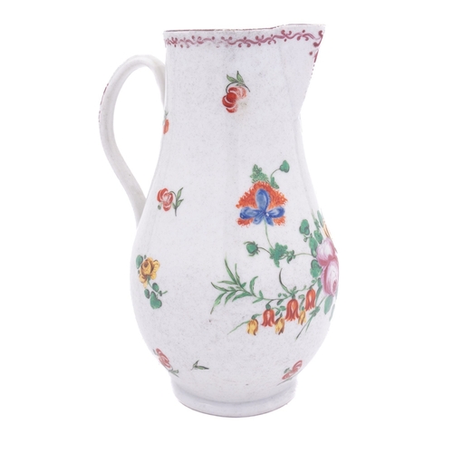 181 - A Plymouth baluster jug with sparrow beak spout and grooved strap handle, painted with a loose bouqu... 