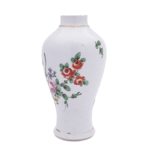 212 - A Plymouth baluster vase painted in bright enamels with a loose bouquet of flowers, scattered sprigs... 