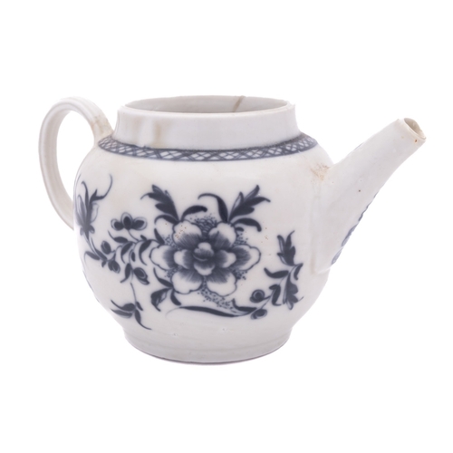 220 - A Plymouth blue and white small teapot painted with peony sprays, a lattice border around the rim, T... 