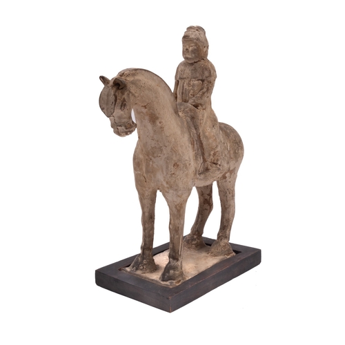 31 - A Chinese equestrian figure, probably Tang Dynasty modelled with a cloaked figure astride a horse st... 