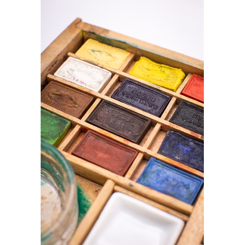 338 - An Edwardian painted beech artist's paintbox, early 20th century; the hinged cover decorated with fi... 