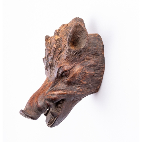 361 - A 'Black Forest' carved and stained wood model of a boar's head, in the manner of a wall trophy, cir... 