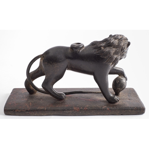 362 - A Continental bronze model of a lion, in the manner of one of the Medici Lions, probably 17th /18th ... 