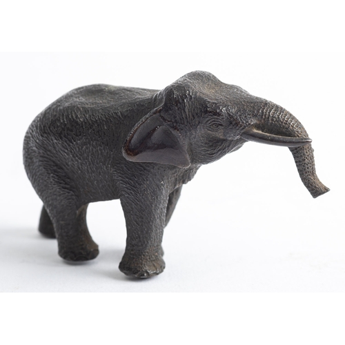 383 - A Continental patinated bronze model of an elephant, early 20th century; naturalistically portrayed ... 