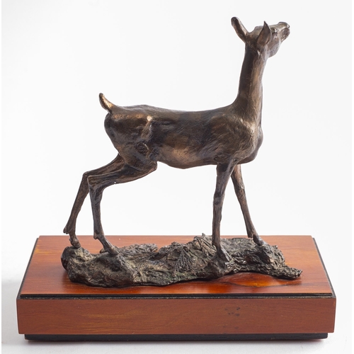 387 - A patinated metal model of a doe, 'Fontainebleau', by Albany Fine China, modern; portrayed standing,... 