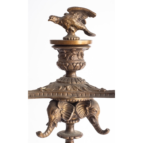 439 - A pair of French bronze four light candelabra, last quarter 19th century; each with a raised, centra... 