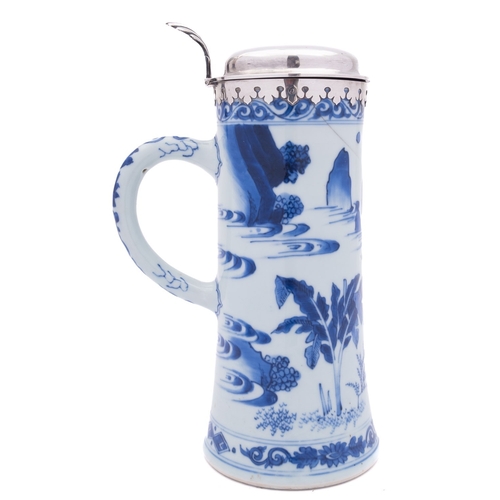 49 - A Chinese silver-mounted blue and white tankard, Transitional of waisted cylindrical form, painted w... 