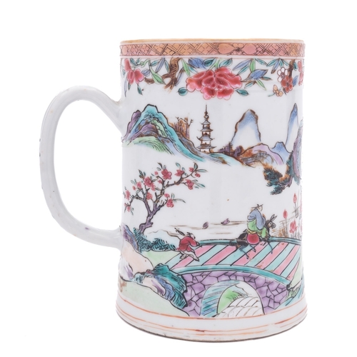 50 - A Chinese famille rose tankard, Qianlong decorated in bright enamels with a mountainous river landsc... 