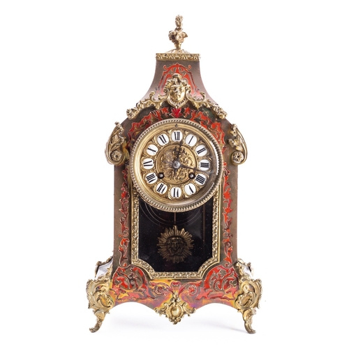 530 - A French mid-Victorian boulle mantel clock having an unsigned eight-day duration movement striking t... 