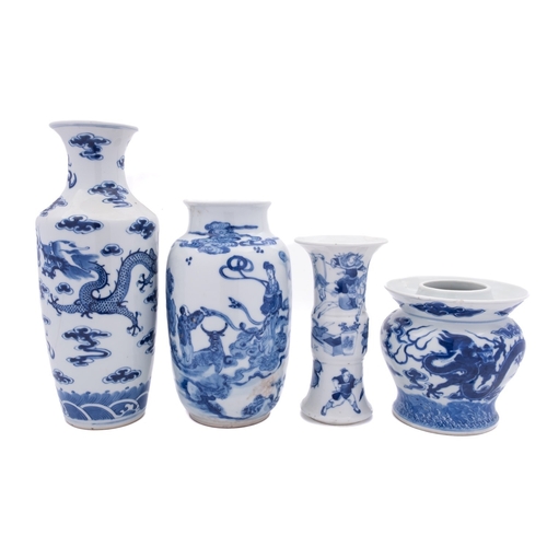 66 - A Chinese blue & white spittoon and three vases, late Qing Dynasty the spittoon painted with dragons... 