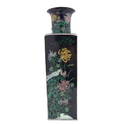 76 - A Chinese famille noire square-section  vase painted with chrysanthemum sprays, bamboo, butterflies ... 