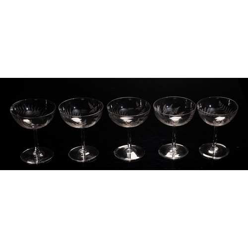 8 - Ten champagne bowls each engraved with fern-like branches, 11.5cm high.