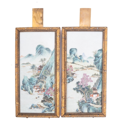 85 - A pair of Chinese famille verte/rose porcelain plaques enamelled with pavilions in extensive mountai... 