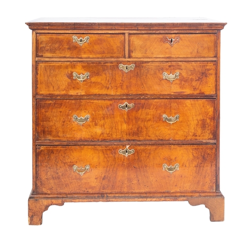 872 - An early 18th Century walnut, crossbanded and feather strung rectangular chest, containing two short... 