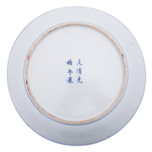 92 - A Chinese 'Lotus Scroll' dish, of shallow circular form decorated with under glaze blue and copper r... 