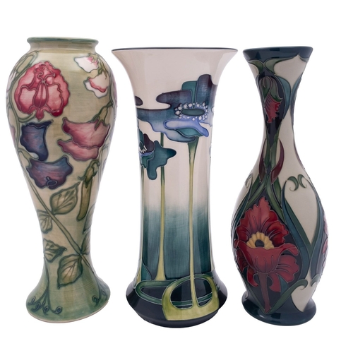 31 - Three Moorcoft pottery vases, comprising Sweet Pea modelled after the original by Sally Tuffin, prin... 