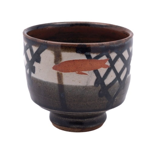 39 - *John Maltby [1936-2020] a stoneware yunomi, the exterior stencilled with fish on a cream, brown and... 