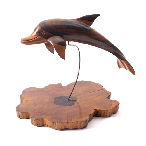 543 - A carved and stained wood, probably olivewood model of a dolphin, modern; naturalistically modelled,... 