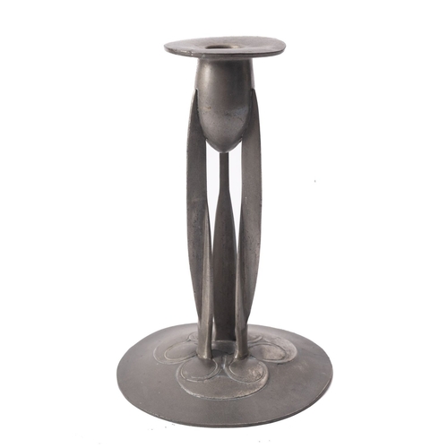 550 - Archibald Knox for Liberty & Co., a Tudric pewter candlestick, early 20th century; with a tulip form... 