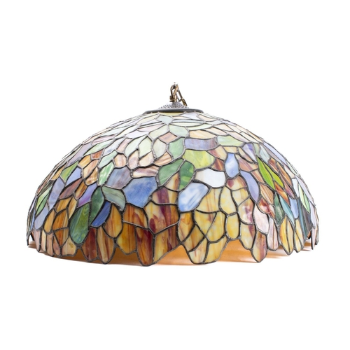 551 - A leaded glass ceiling lamp in the manner of work by Tiffany, later 20th century; of domed form, enc... 