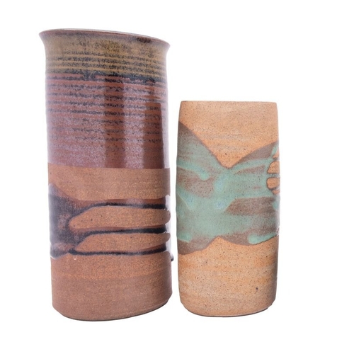 61 - *Peter Lane [b 1932] two stoneware vases, one of cylinder form under banded brown and green glazes, ... 