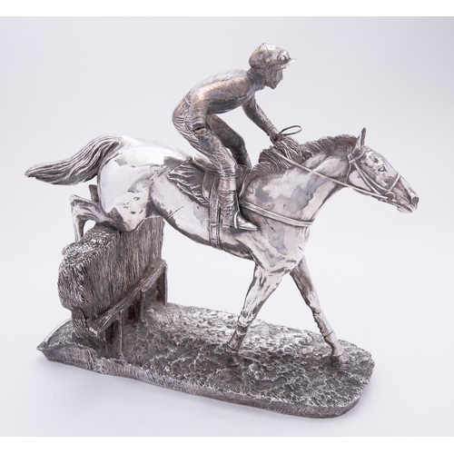 1 - An Elizabeth II silver covered resin horse racing sculpture 'Over the Sticks' by Camelot Silverware ... 