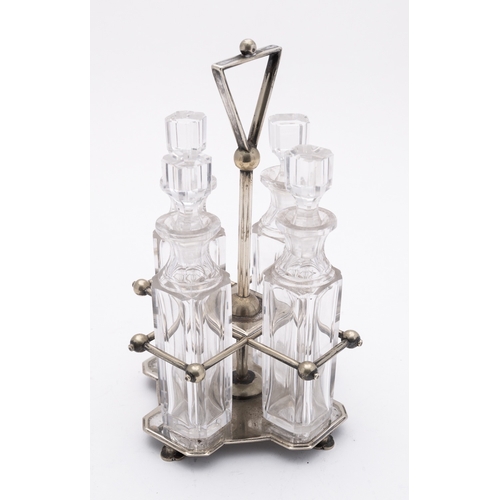 11 - An early 20th century silver plated four bottle cruet by Hukin & Heath, London, model number 1290, a... 