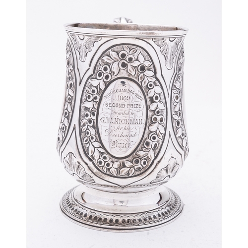 134 - A George III silver mug, marks almost rubbed out probably London 1803, of baluster form, with later ... 