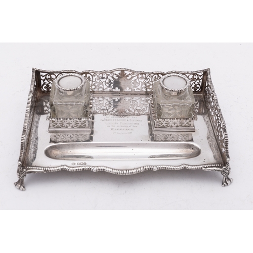 167 - An Edward VII silver inkstand by William Hutton & Sons Ltd, London 1901, the wavy rim above a pierce... 