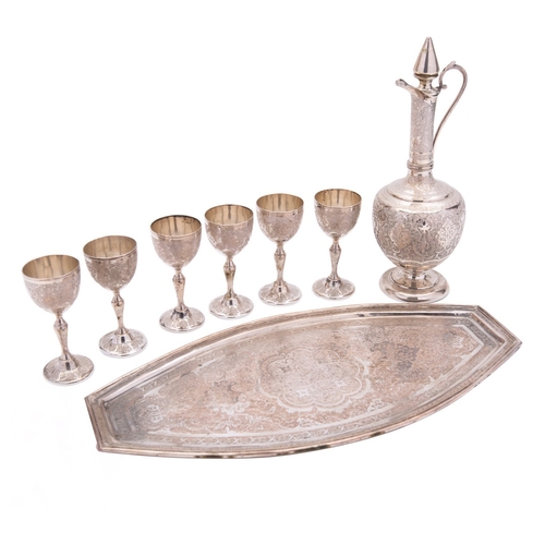 170 - A mid 20th century Persian export silver plated liqueur set, unmarked, comprising  an oval tray, six... 