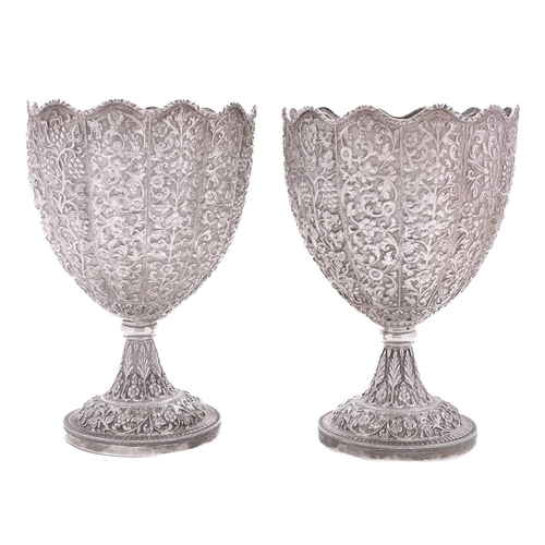 175 - A pair of late 19th century Indian Kutch silver standing cups or goblets marked W&O, probably Luckno... 