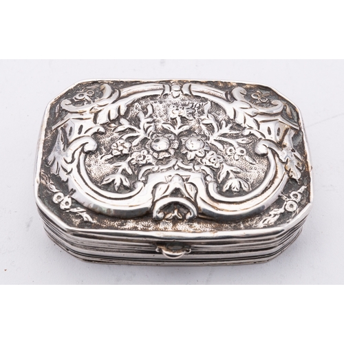 181 - A 19th century Ottoman silver snuff box, marks rubbed out, of rectangular canted form, the hinge lid... 