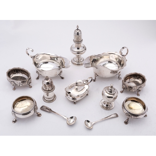 24 - A mixed group of silver including; a George V muffineer Birmingham 1913, a silver sauce boat maker's... 