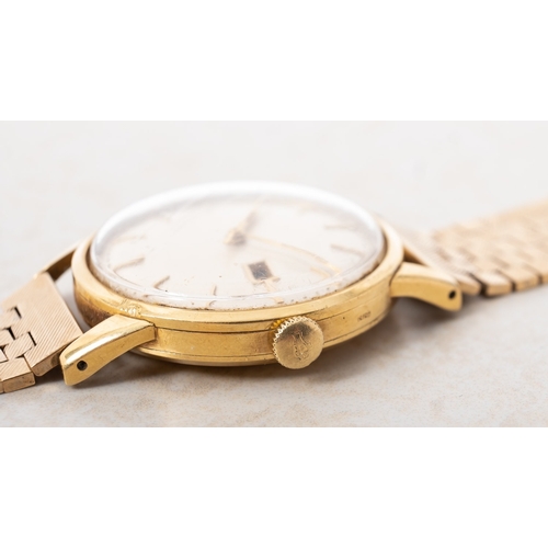 320 - International Watch Company (I.W.C.) a 9ct gold wrist watch the round cream dial with raised gilt ba... 