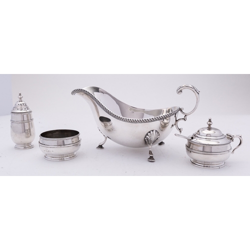 36 - A mixed group of silver including; an Elizabeth II silver sauce boat by Barker Ellis Silver Co, Birm... 